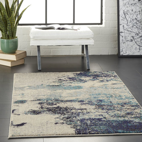2' X 4' Ivory And Teal Blue Abstract Power Loom Non Skid Area Rug